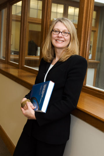 Amy Hutton, assistant
professor [check title] of management
